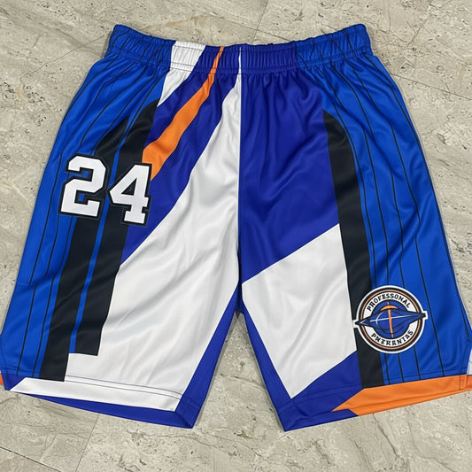 Colorful athletic shorts with blue, white, and orange design on a concrete floor.