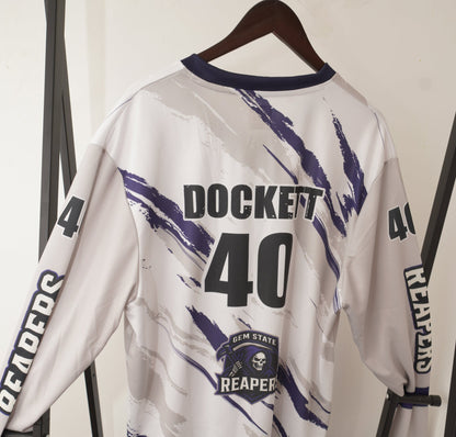 White jacket with black text and graphics on a white background