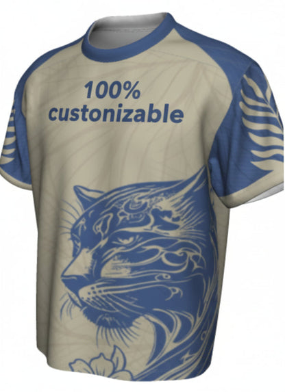 Two t-shirts with cat designs, one in beige with blue accents and the other in black with white accents.